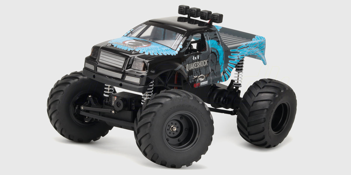 Quakeshock monster truck forfra med sort og blå karrosse, fire LED-lys på taget og store sorte offroad-dæk