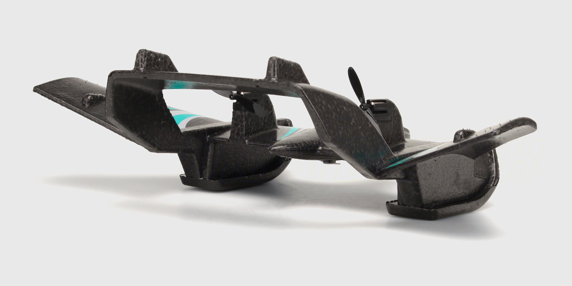 Aqua Wingz vandfly set skråt bagfra med pontoner og propeller