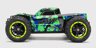 Grøn Hunter MT10 monster truck set fra siden på hvid baggrund.