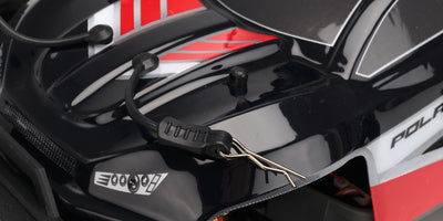 Hurricane XL fjernstyret monster truck med store offroad-hjul og grønt karrosseri set forfra på hvid baggrund.