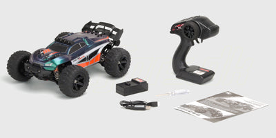 Hurricane XL fjernstyret bil i original emballage med alt udstyr vist på hvid baggrund.