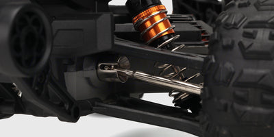 Blå Hurricane XL Brushless fjernstyret monster truck med store offroad hjul vist fra siden på hvid baggrund.