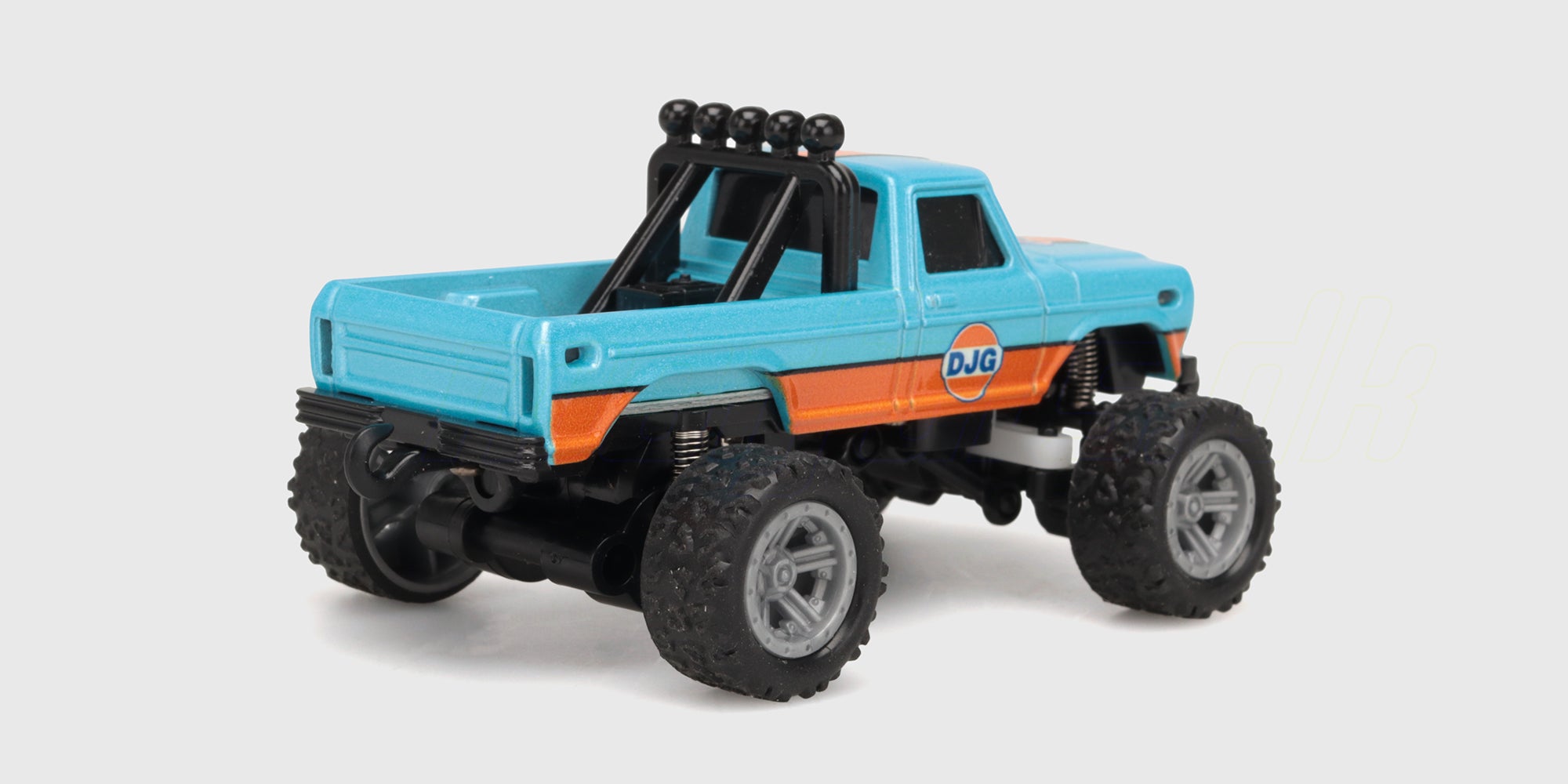 Blå og orange Mini RC Car Pick-up med åbent lad set skråt bagfra