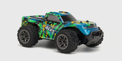 Rapid Monster Truck i rød og sort med store offroad-hjul og robust affjedring vist forfra.
