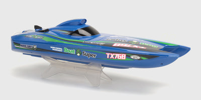 Grøn Super Dino Brushless Racing Boat med haj-grafik set forfra på en hvid baggrund.