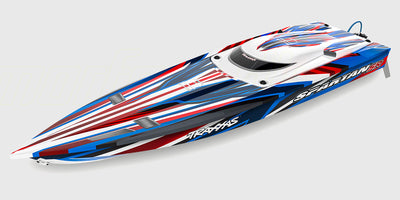 Strømlinet orange Traxxas Spartan SR racerbåd med deep-V skrog og selvoprettende funktion.