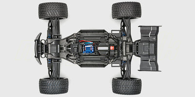 Chassis set oppefra på en Traxxas XRT Race Truck 8s, der viser de interne komponenter og den brede opsætning.