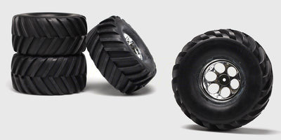 To sorte SHT Mover V offroad hjul med groft dækmønster til fjernstyrede biler vist fra siden.