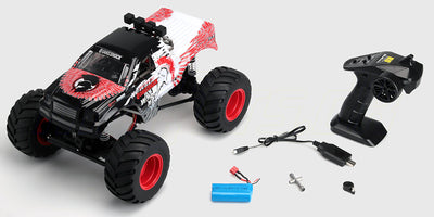 Rød Quakeshock fjernstyret monster truck med store hjul og 4-hjulstræk til børn og begyndere.